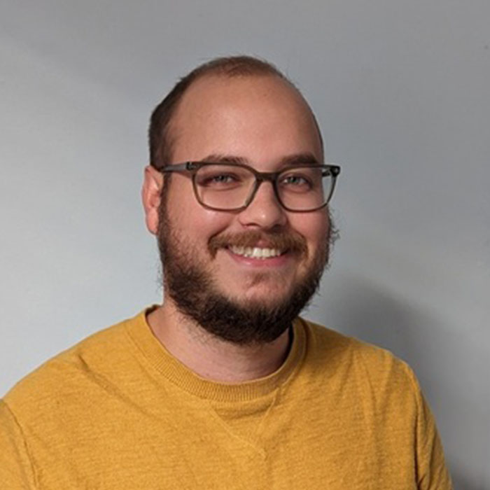 Travis DeMint headshot
